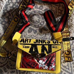 Small yellow bag with straps.